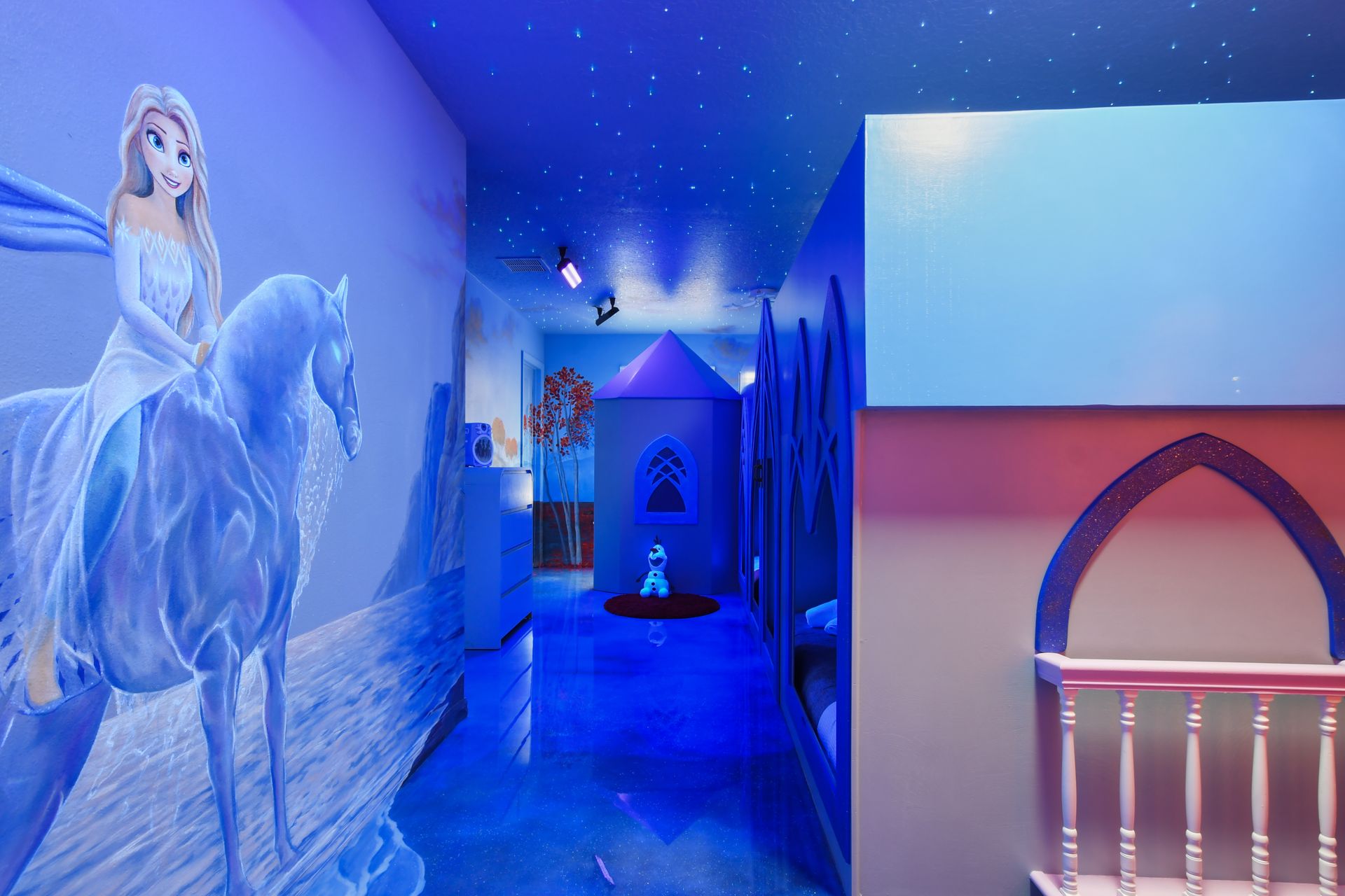 Enchanting ice castle room with starry skies and magical decor!