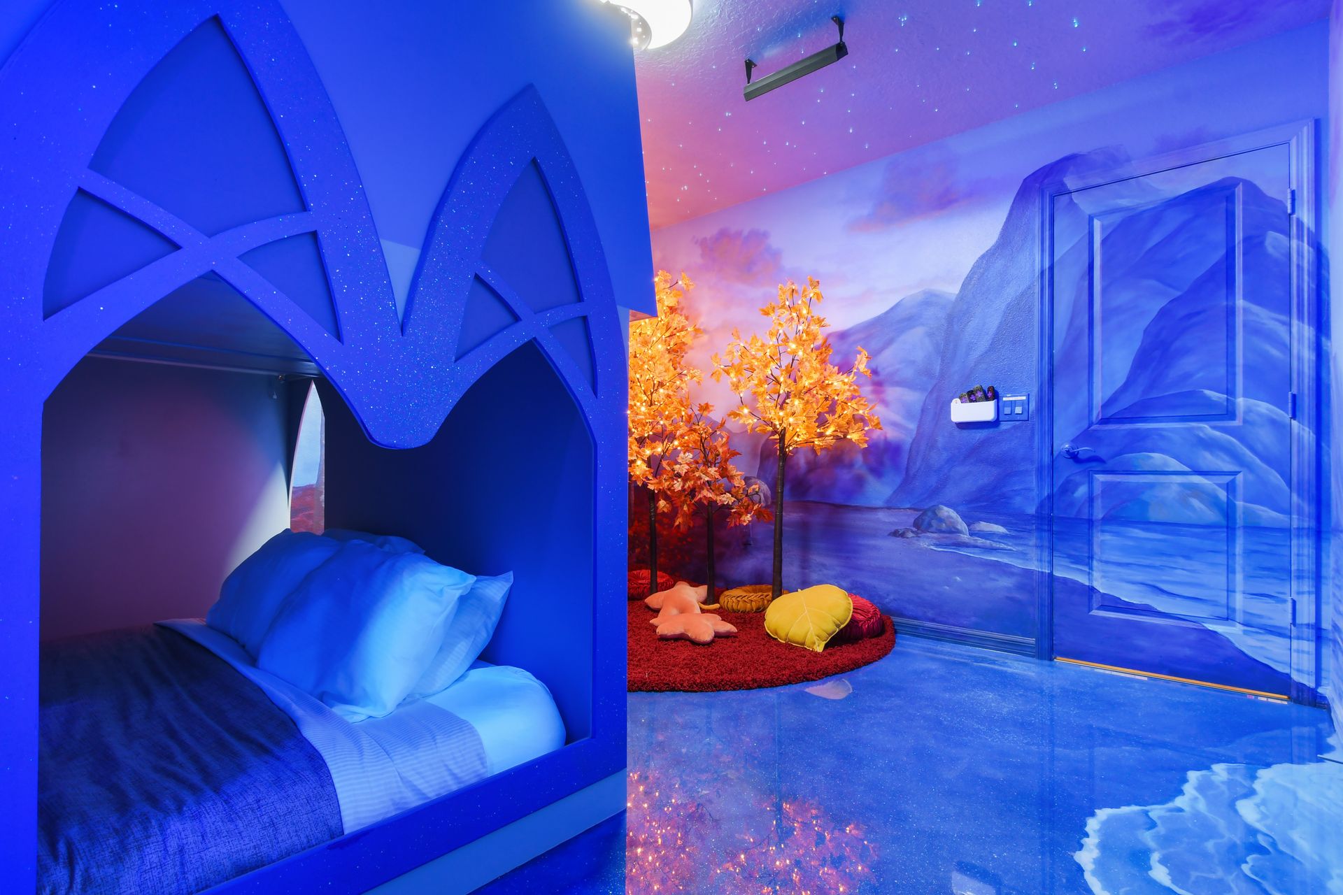 Magical ice-themed room with cozy bunks, glowing trees, and stars!