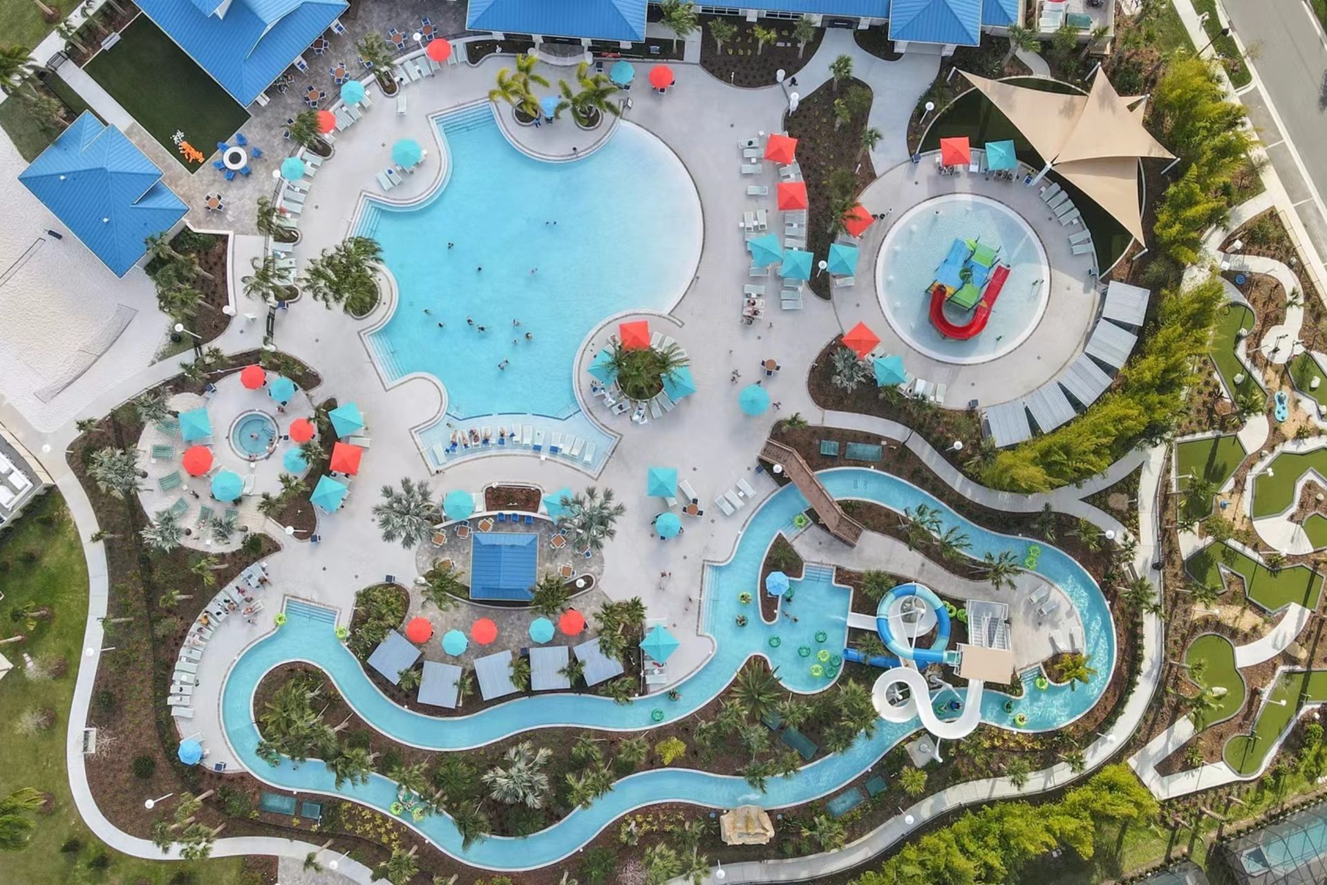 Resort amenities: lazy river, pools, slides, and mini golf.